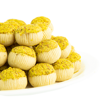 Load image into Gallery viewer, Tunisian almond tajin dessert cut into small squares by Masmoudi Gourmet